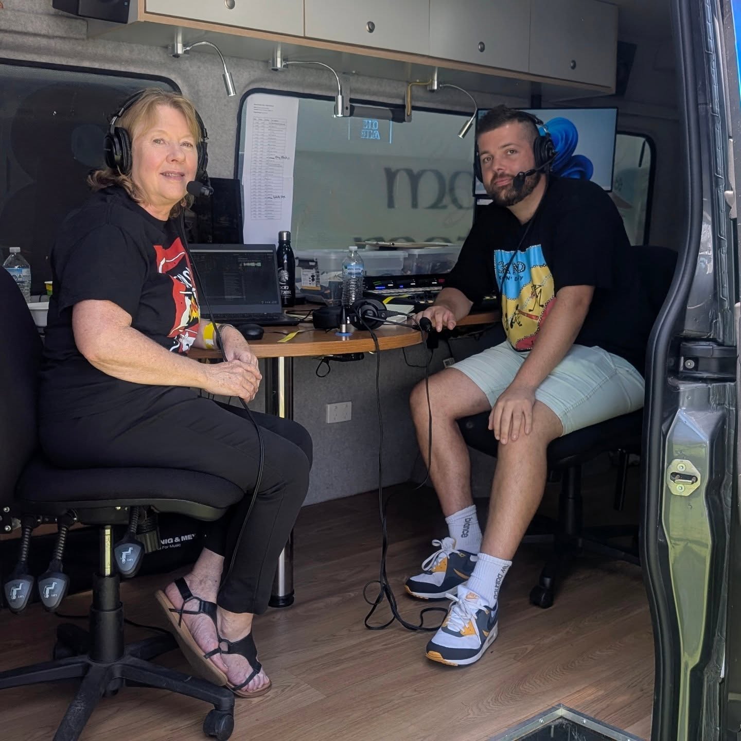 Suzi Hutchings (host of PBS' Subway Sounds) and Aden from 3KND simulcast live from Share The Spirit at Treasury Gardens on January 26 inside the 3 KND OB van