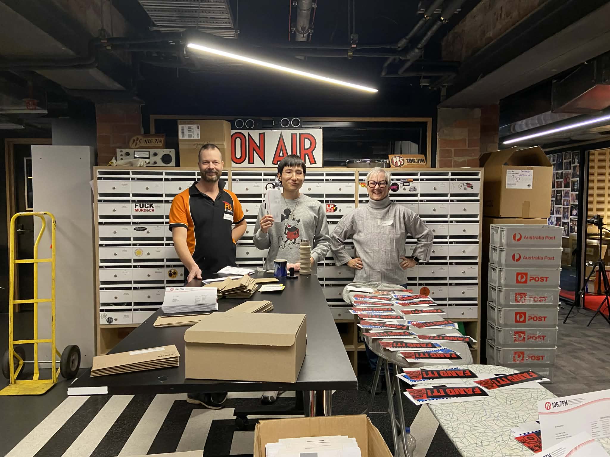 Tom, Yuki and Joni were amongst the team to help pack PBS memberships in 2025 Photo by Mara Williams Tom, Yuki and Joni were amongst the team to help pack PBS memberships in 2025 Photo by Mara Williams