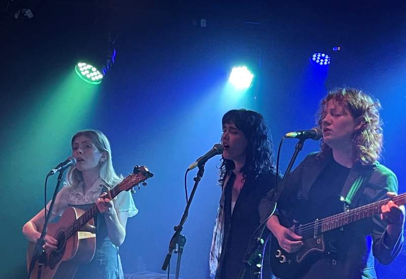 Three people playing music